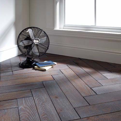 Hardwood floor with black fan